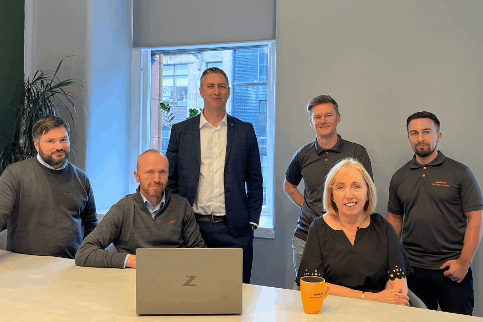 D+M Team 6 Months Post-Acquisition in Wallace Whittle Glasgow Office